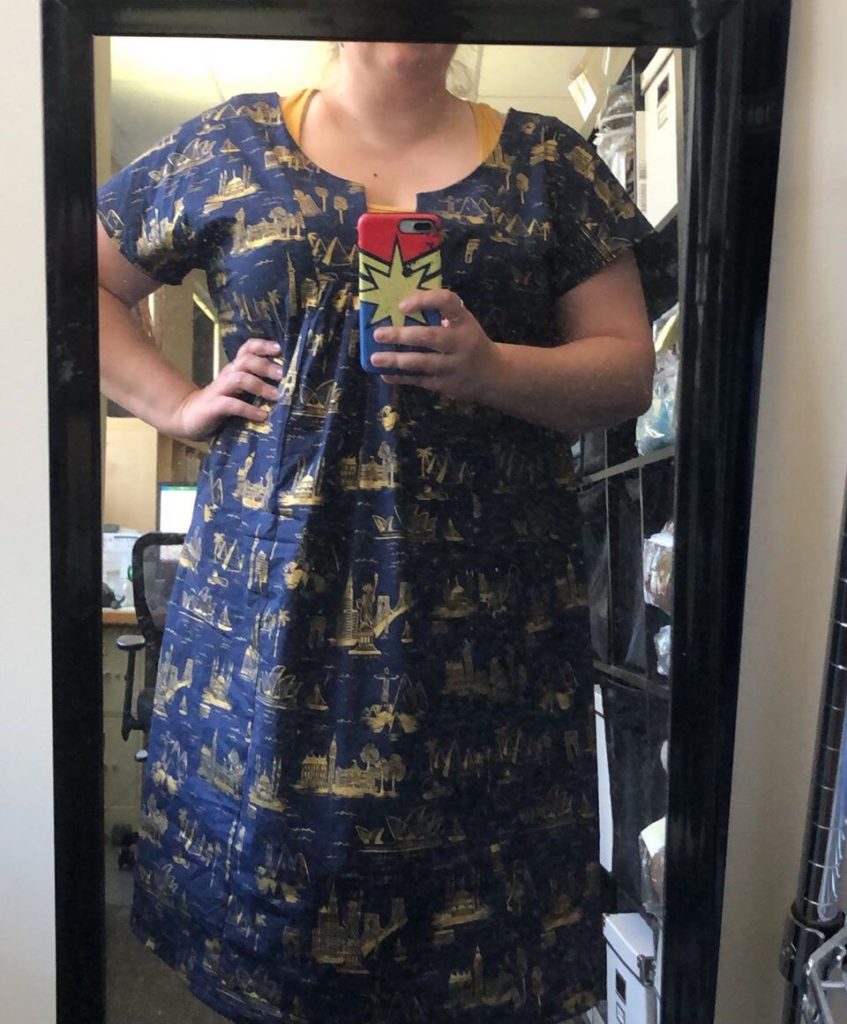 A mirror selfie of me wearing my dark blue Mojave dress. 